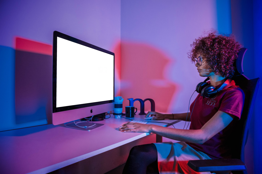 Desktop Mockup: girl working playing with desktop pc